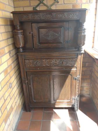 Image 1 of Old court cupboard. Thought to be solid oak.