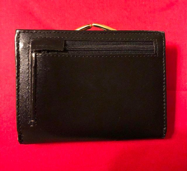 Preview of the first image of LEATHER PURSE/WALLET WHICH IS NEW.