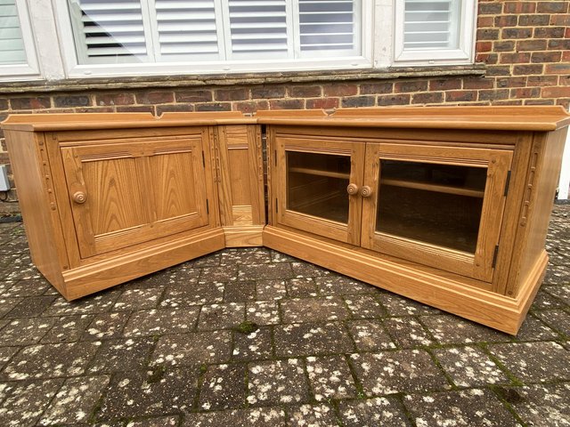 Preview of the first image of Ercol Mural Light Elm TV Cabinet Corner Units x3.