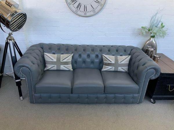 Image 2 of Grey Chesterfield sofa. Armchair & footstool available.