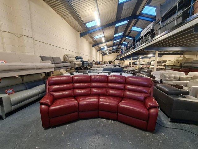 Preview of the first image of Broxton red leather curved electric recliner 4 seater sofa.