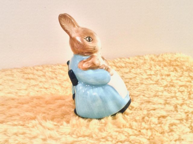 Preview of the first image of Beatrix Potter’s Mrs Rabbit & Bunnies Figure.