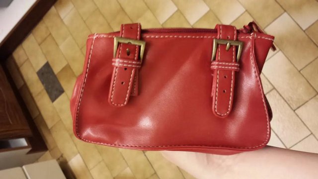 Preview of the first image of Red Faux Leather Makeup Bag.