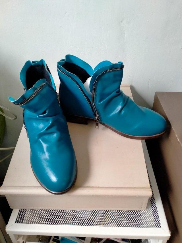 Preview of the first image of Ladies blue leather Pixie Boots.