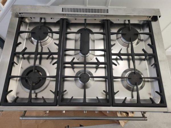 Image 2 of Smeg Opera 90cm wide dual fuel range cooker cream/stainless