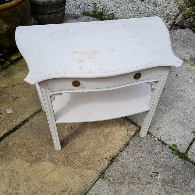 Preview of the first image of Small white chips dressing table 3ft by 2ft.