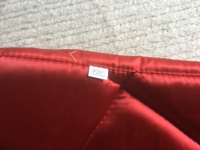 Preview of the first image of Striking Red Satin Pony Saddle Cloth.