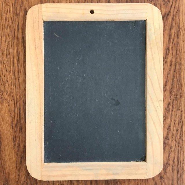 Preview of the first image of Vintage black slate chalkboard, with wooden frame. Can post..