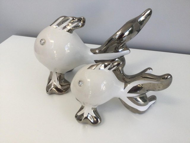 Preview of the first image of White and silver Fish ornaments.