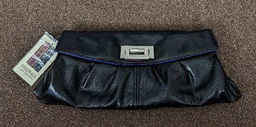 Preview of the first image of Beautiful Brand New Ladies Black Clutch Bag.