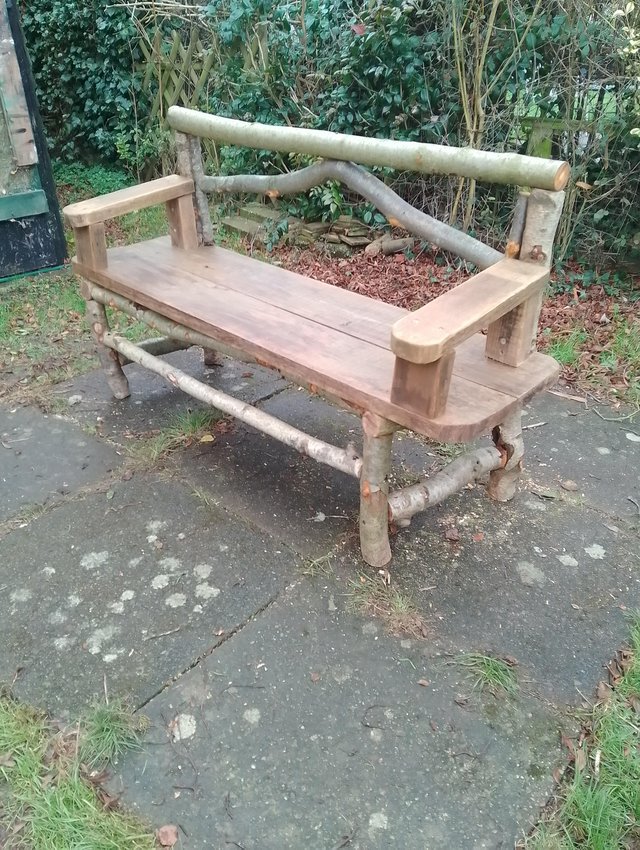 Preview of the first image of Handcrafted Rustic Memorial Pet Bench.