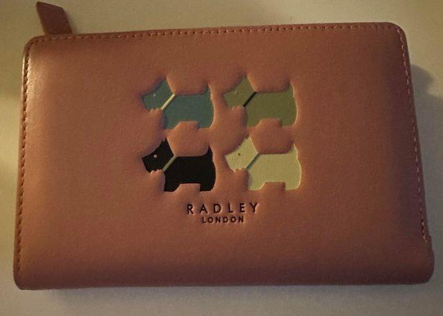 Preview of the first image of Radley pink medium leather purse.