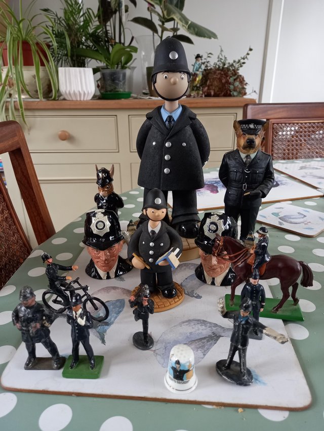 Preview of the first image of Police Figues,  Royal doulton,and metal.