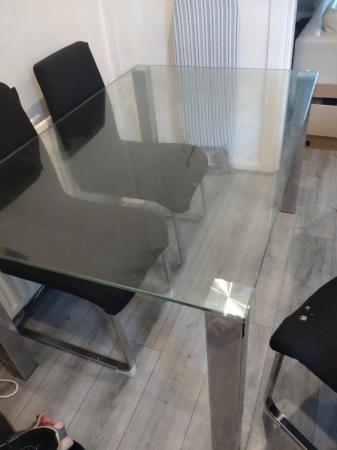 Image 1 of Glass table and 4 chairs