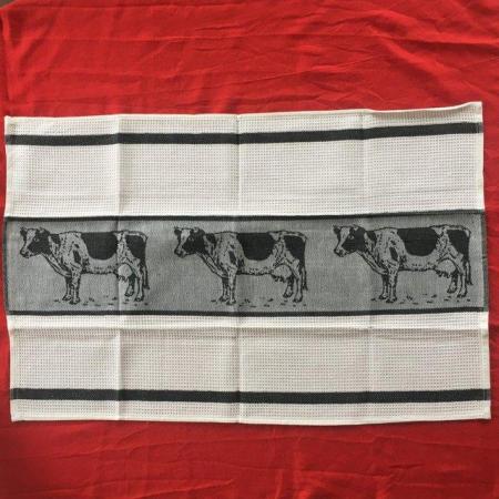 Image 1 of New tea towel, black & white cow design. 100% cotton.