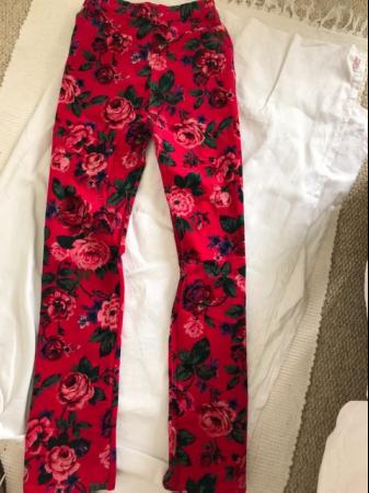Image 1 of Unusual Stretch Floral trousers size 38 pink background