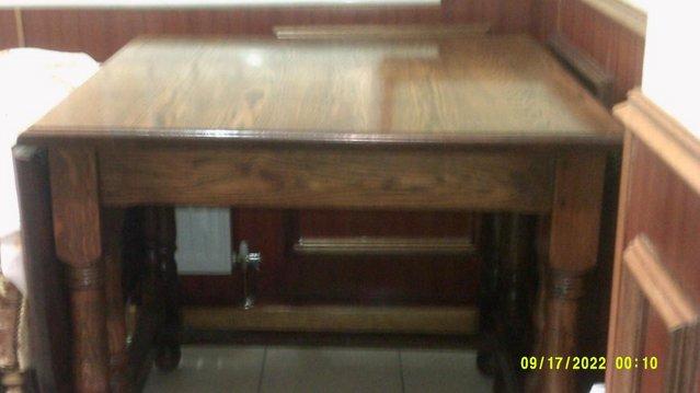 Image 1 of Solid Oak Wood Dinning Table. Size 36 inch square with 18 in