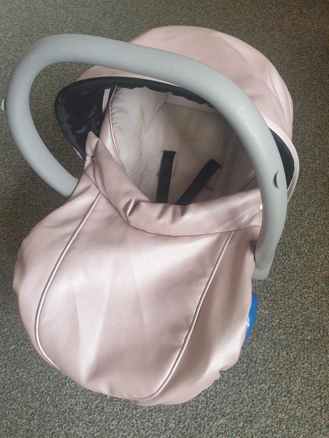 Preview of the first image of Faux leather carseat from Newborn.