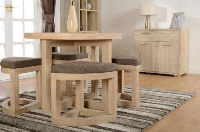 Image 1 of Cambourne stowaway dining set.