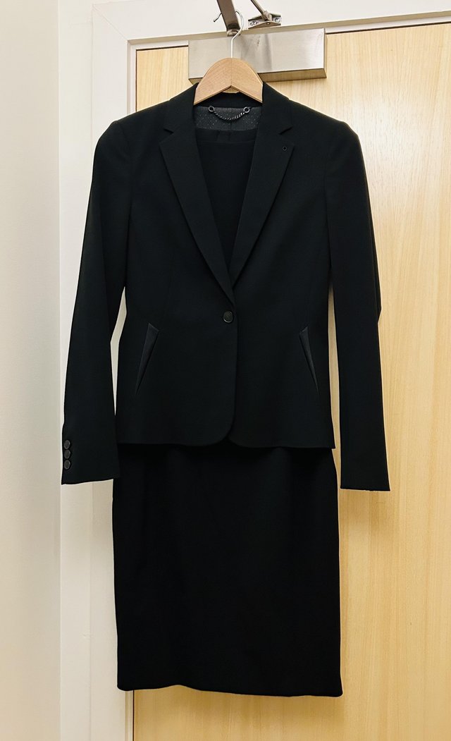 Preview of the first image of New Jigsaw black dress and matching jacket, size 10.