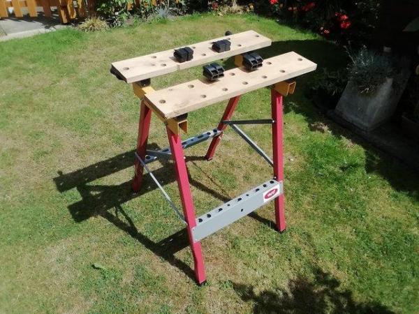 Image 1 of SOLDSOLD FOLDING WORKBENCH WITH VICECLAMPS