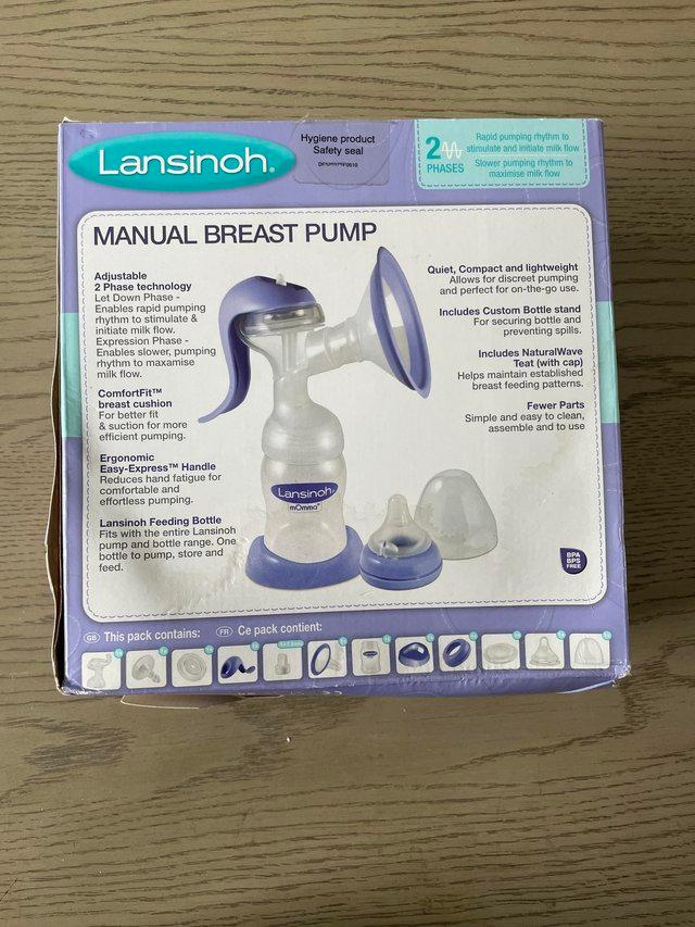Preview of the first image of Lansinoh manual breast pump boxed.