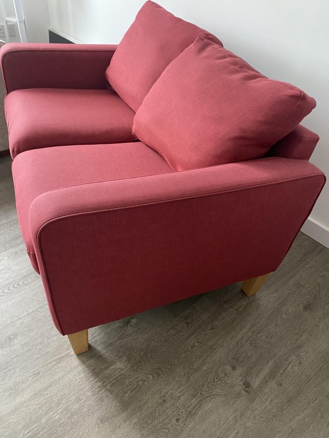 Preview of the first image of John Lewis red 2 seater sofa.