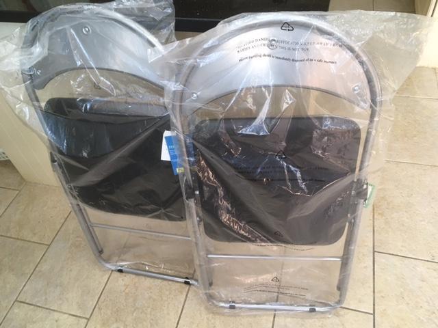 Preview of the first image of Two Folding Black PVC Padded Chairs (New).