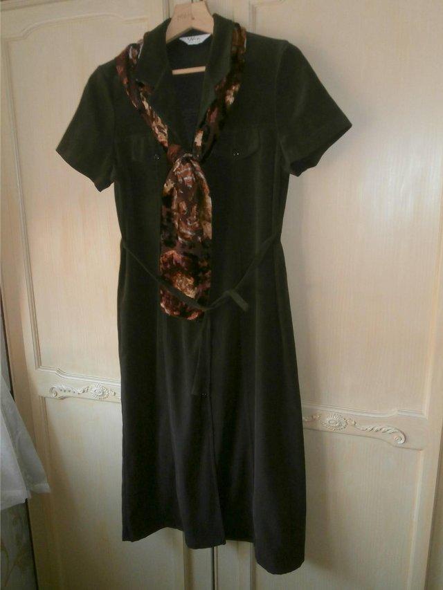 Preview of the first image of NEW MINT DARK BROWN LADIES DRESS WITH SCARF.