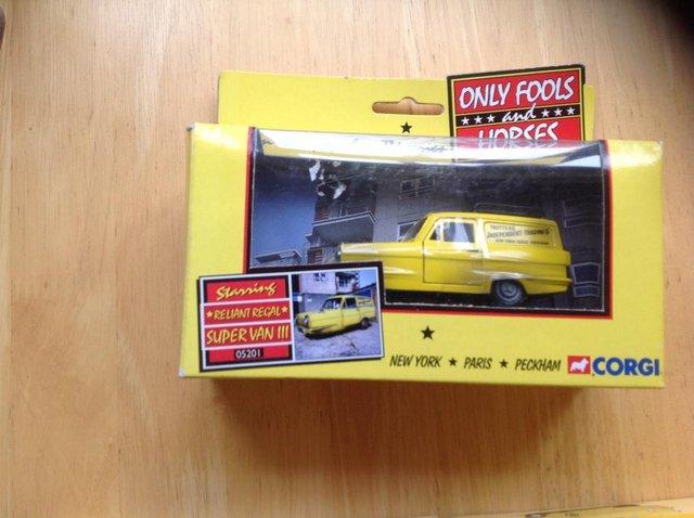 Preview of the first image of Corgi Yellow reliant dell boy van.
