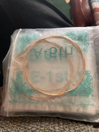 Image 1 of 12. Guitar strings. brand-new never used 12 for £10