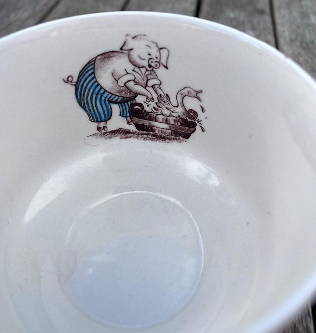 Preview of the first image of Porcelain cup with sporty animal characters.