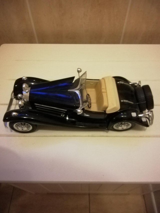 Preview of the first image of Burago 1:18 scale model cars.