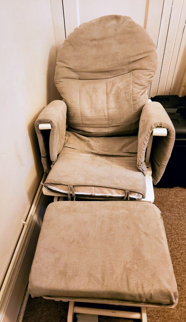 Preview of the first image of Nursing rocker chair and matching rocking foot stool.