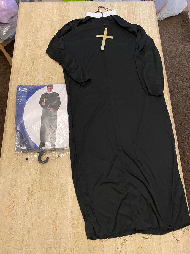 Preview of the first image of Men’s fancy dress priest costume.