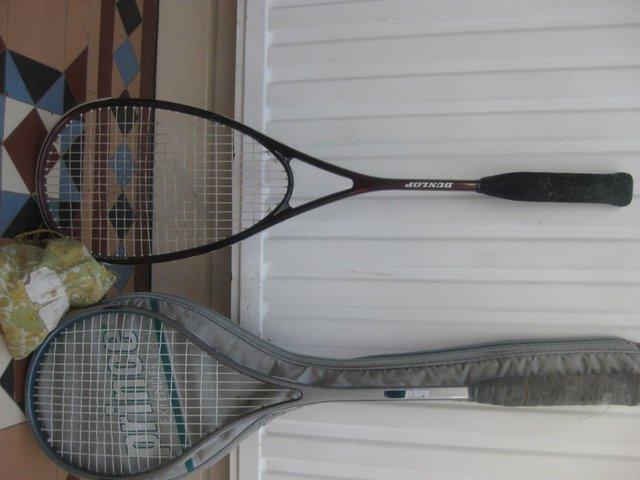 Preview of the first image of Adult squash racket + balls x 2.