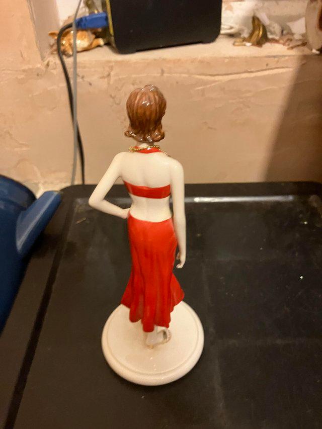 Preview of the first image of Coalport lady figurine - birthstone collection - July - ruby.