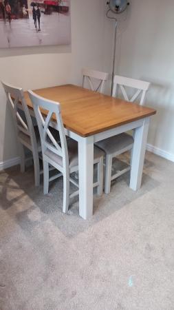 Image 2 of Extending table and four chairs.