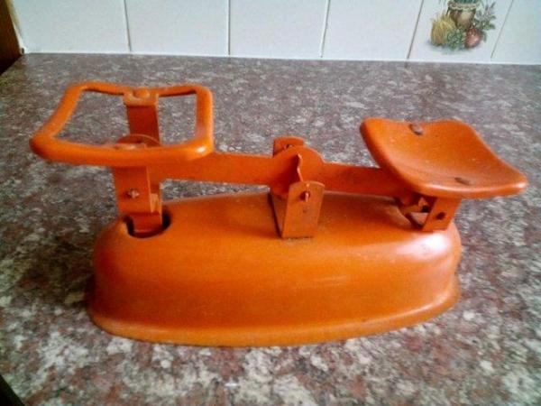 Image 1 of METAL SCALES £3 ORANGE USED FOR LONG TIME