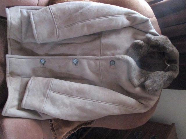 Preview of the first image of Sheepskin three quarter length Jacket.