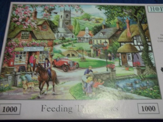 Preview of the first image of FEEDING THE DUCKS House of Puzzles 1000 piece jigsaw.