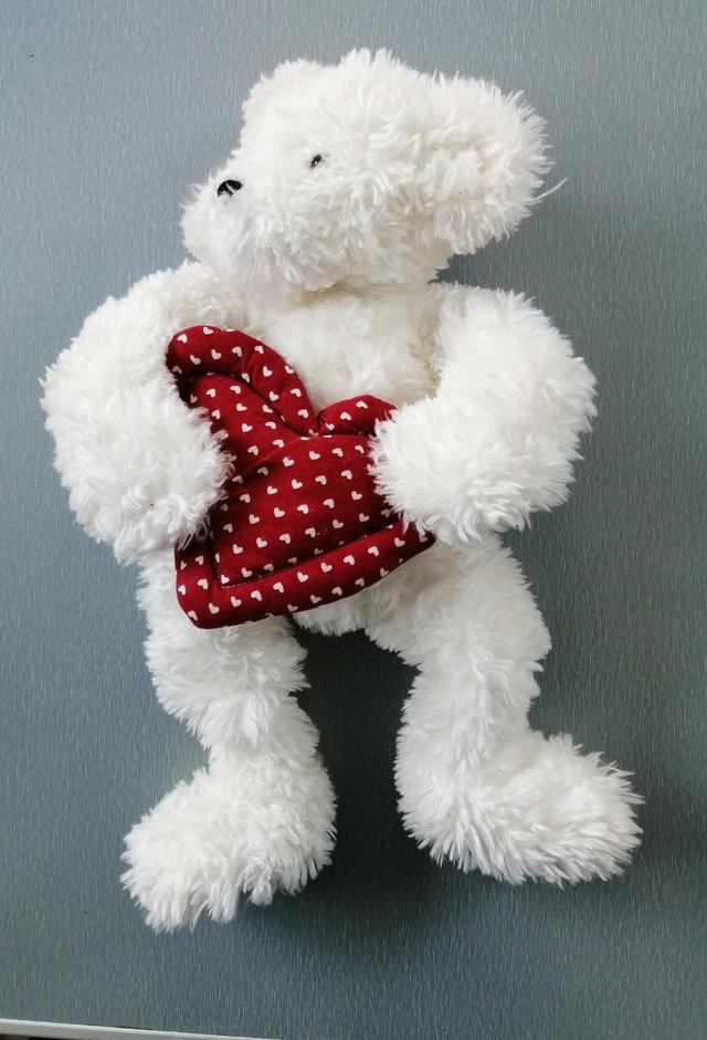 Preview of the first image of A White Shaggy 16" Boyds Bear..