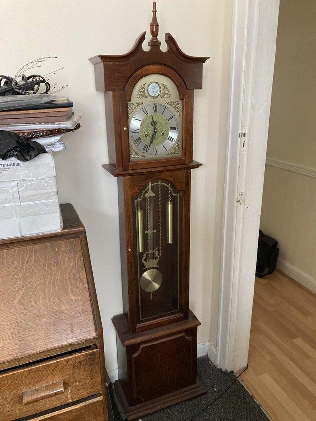 Preview of the first image of Stunning Tempus Fugit Grandfather Clock.