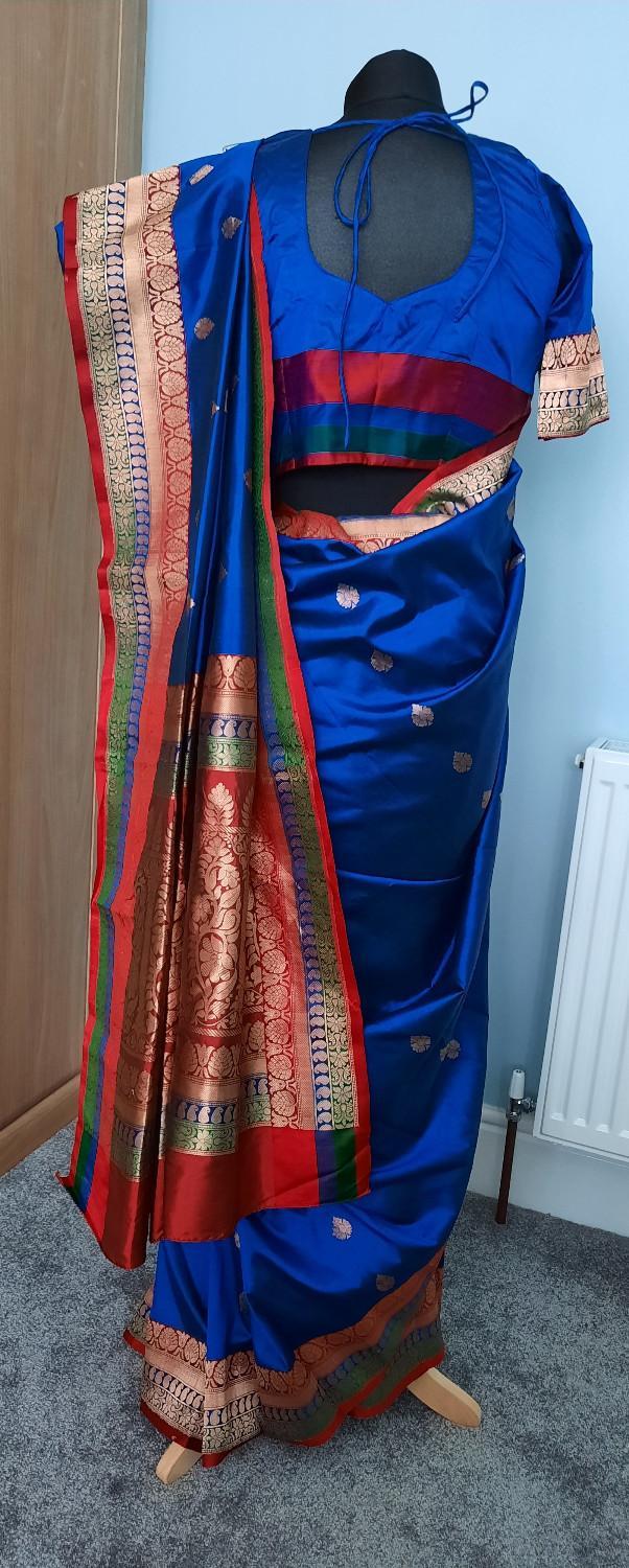 Preview of the first image of Rich royal blue and red banarsi silk saree.