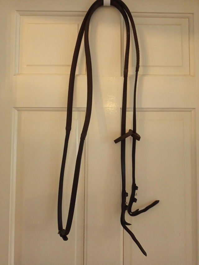 Preview of the first image of Rubber and Leather Reins Brown.