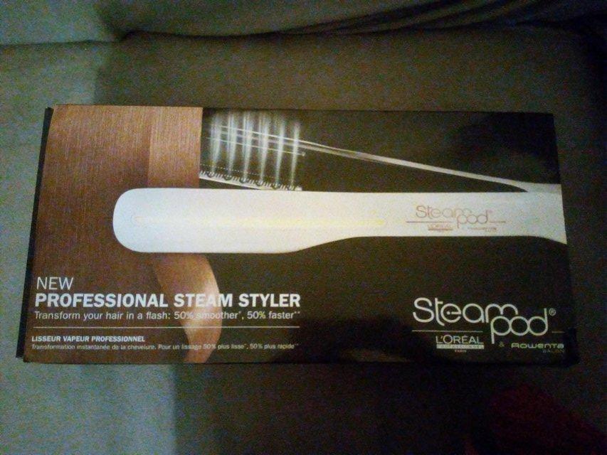 Preview of the first image of L'Oreal Steam Pod hair flat iron.