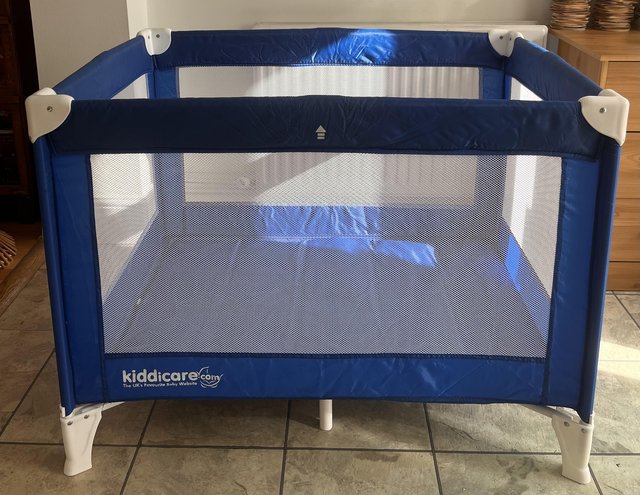Preview of the first image of Kiddicare KIP Travel cot - sapphire/blue.