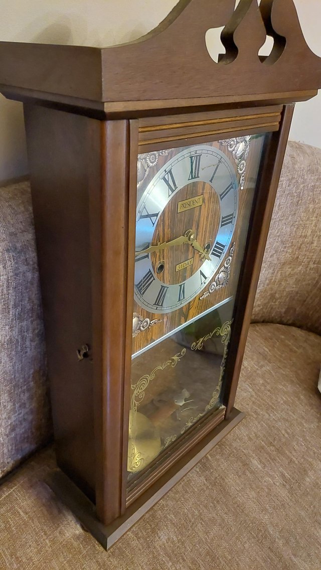 Preview of the first image of Antique president pendulum clock.