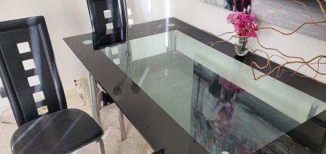 Image 2 of Glass Dining Table With shelf.underneath