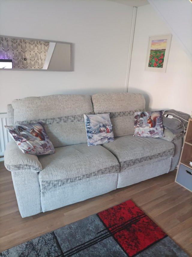 Preview of the first image of Large sofa... excellent condition..light grey.